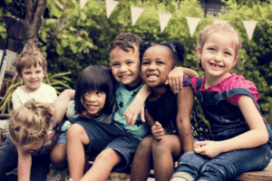 Children with wooden building blocks from MERLE TOYS®